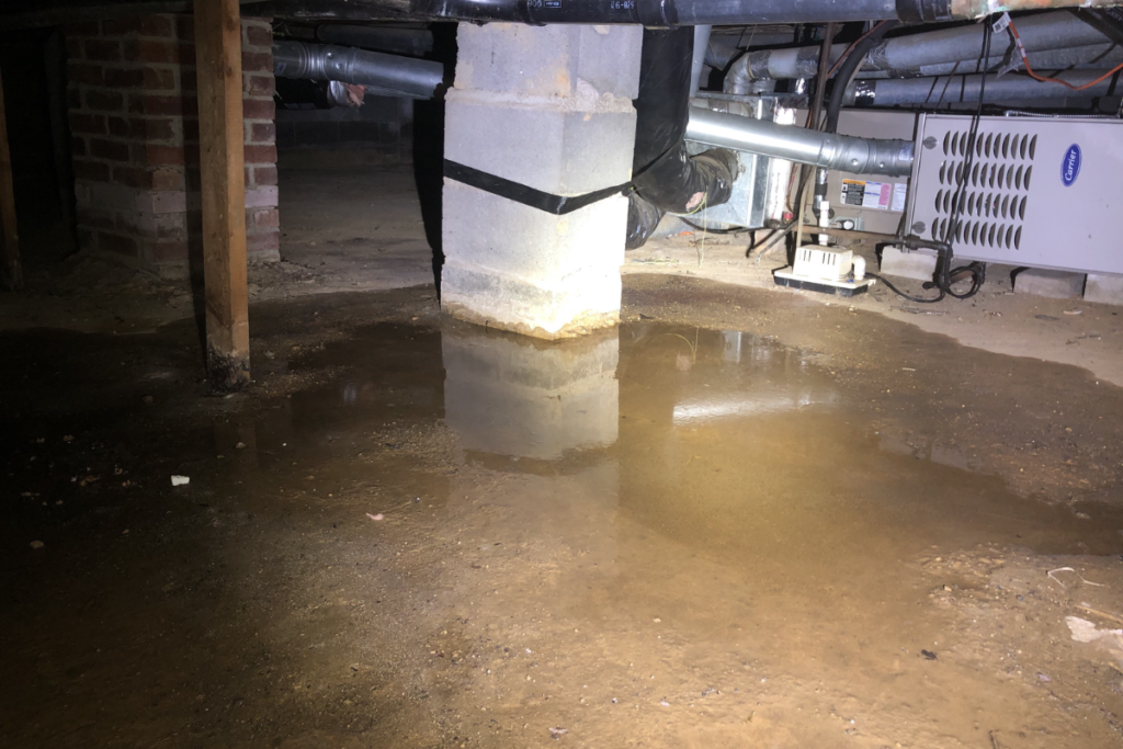 common crawlspace issues of standing water on dirt crawlspace floor