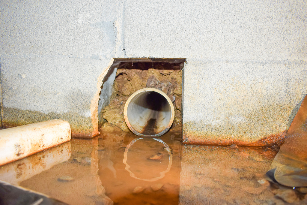 standing water in crawlspace in need of flooding prevention